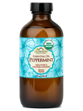 US Organic Peppermint essential oil, 8 fl oz amber bottle with black screw cap and blue floral label.